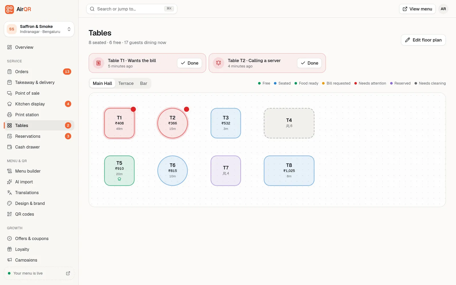 The AirQR live floor plan showing tables with running bills, a Wants the bill request, area tabs and a colour legend for free, seated and reserved