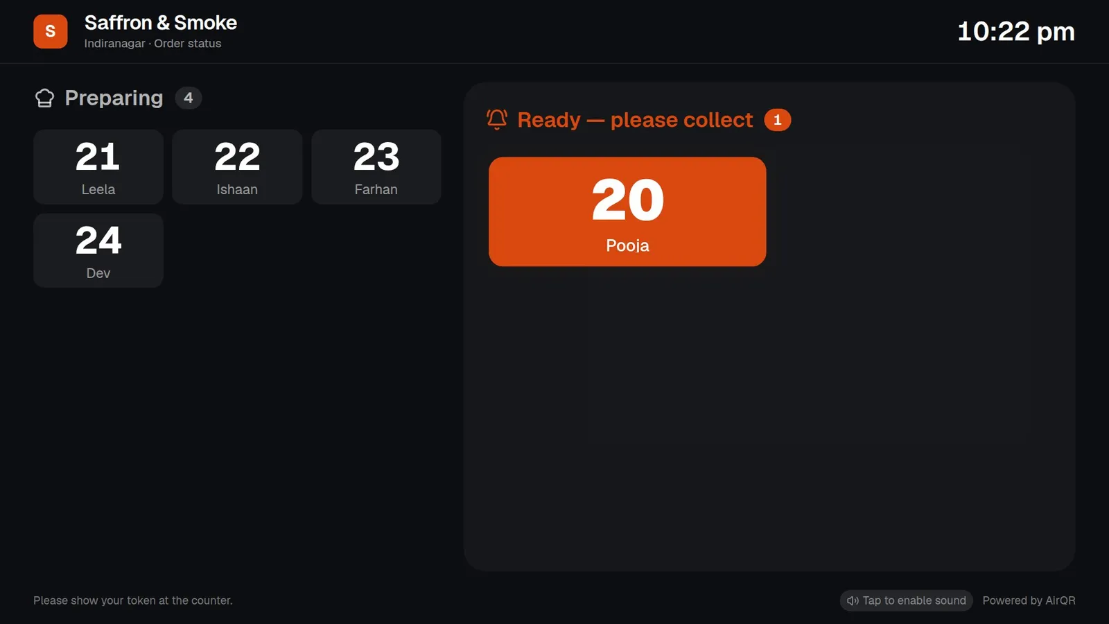 A TV order-ready screen with tokens under Preparing on one side and Ready on the other side